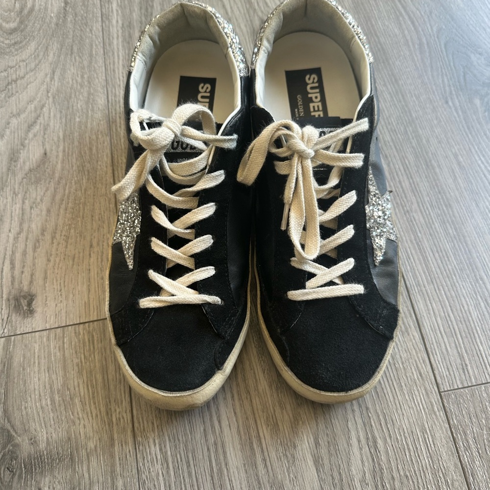 Golden Goose Superstar Sneakers in Black and Cream